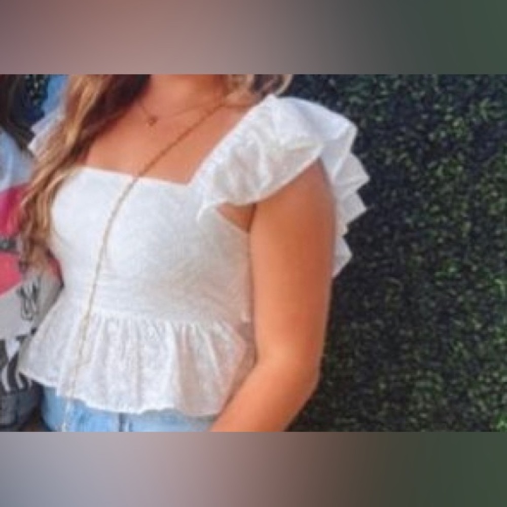 Woman’s white top